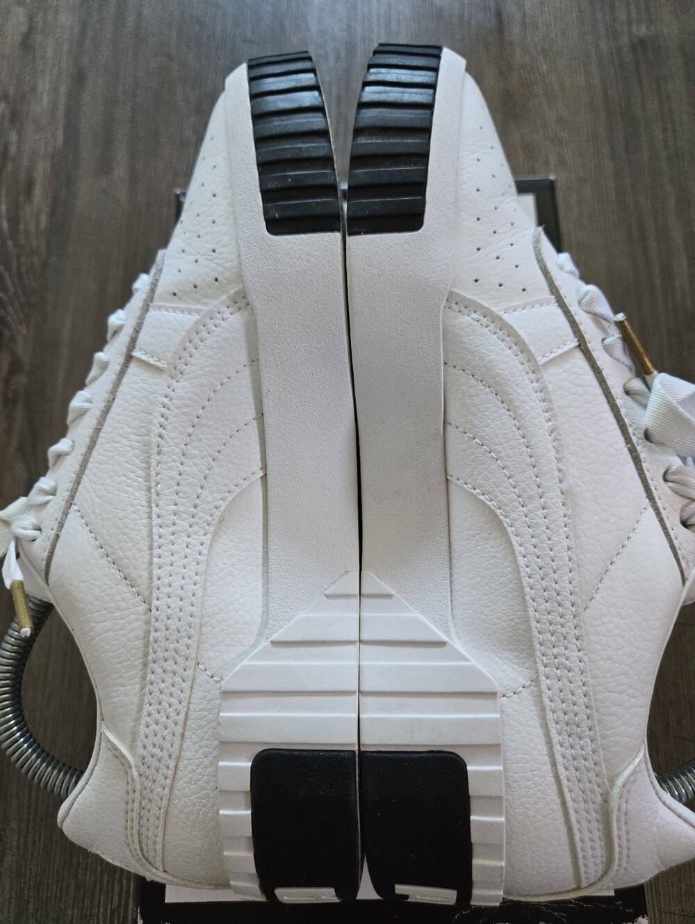 Puma Cali White Leather Low-Top Sneakers with Black Heel Accents (36915504)